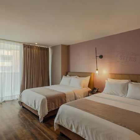 فندق سايتس ميديلين المظهر الخارجي الصورة A room at the hotel