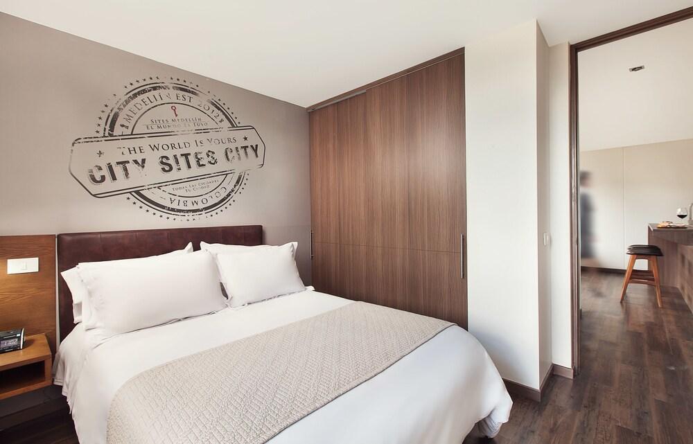 فندق سايتس ميديلين المظهر الخارجي الصورة A bedroom in a typical apartment