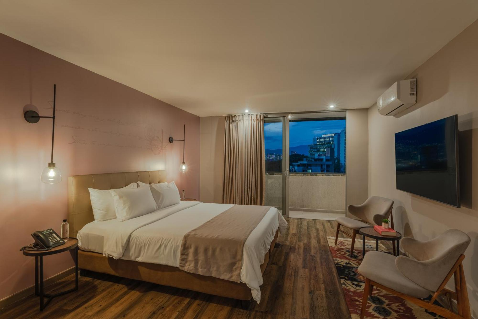 فندق سايتس ميديلين المظهر الخارجي الصورة A bedroom at the hotel