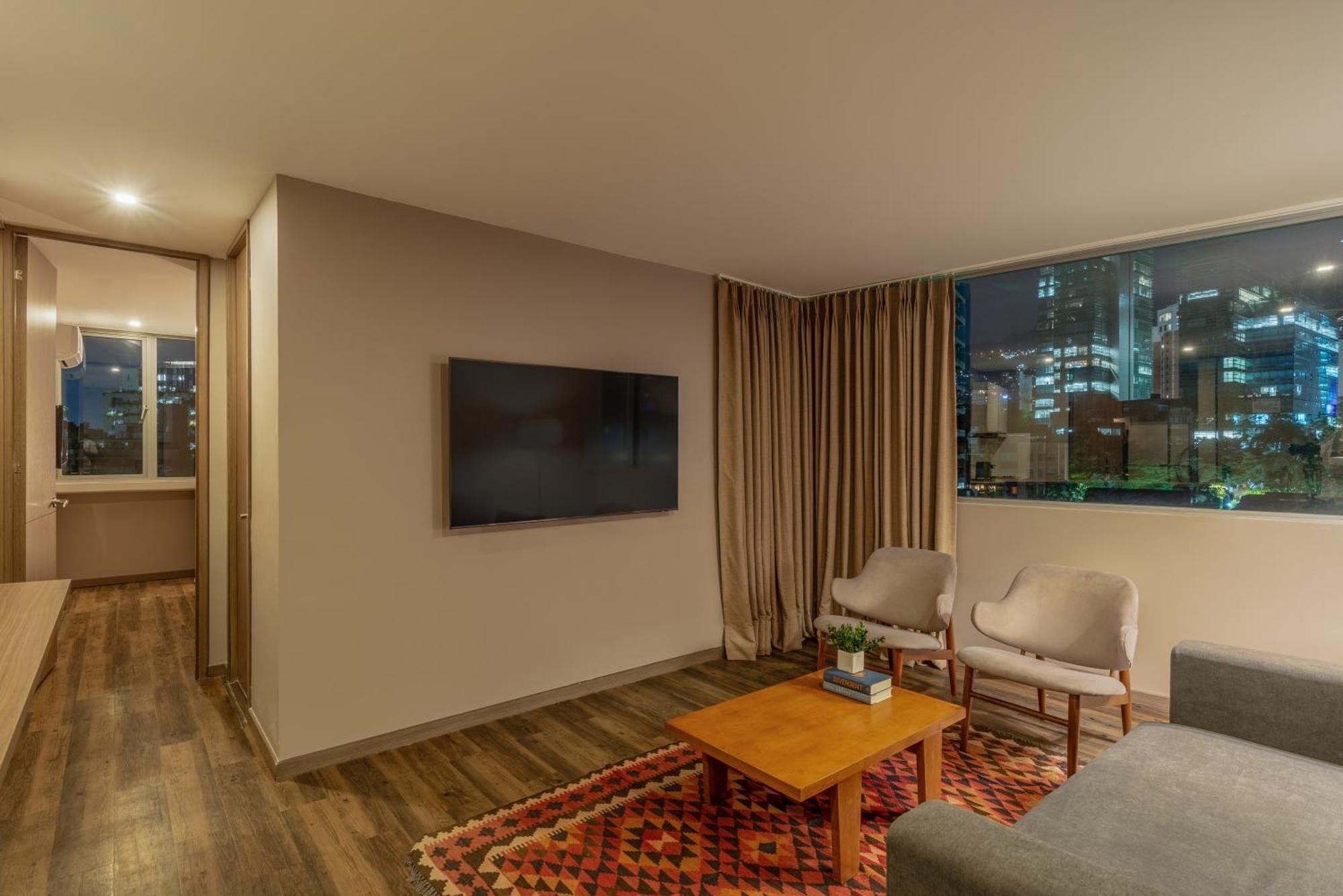 فندق سايتس ميديلين المظهر الخارجي الصورة A living room in a modern apartment