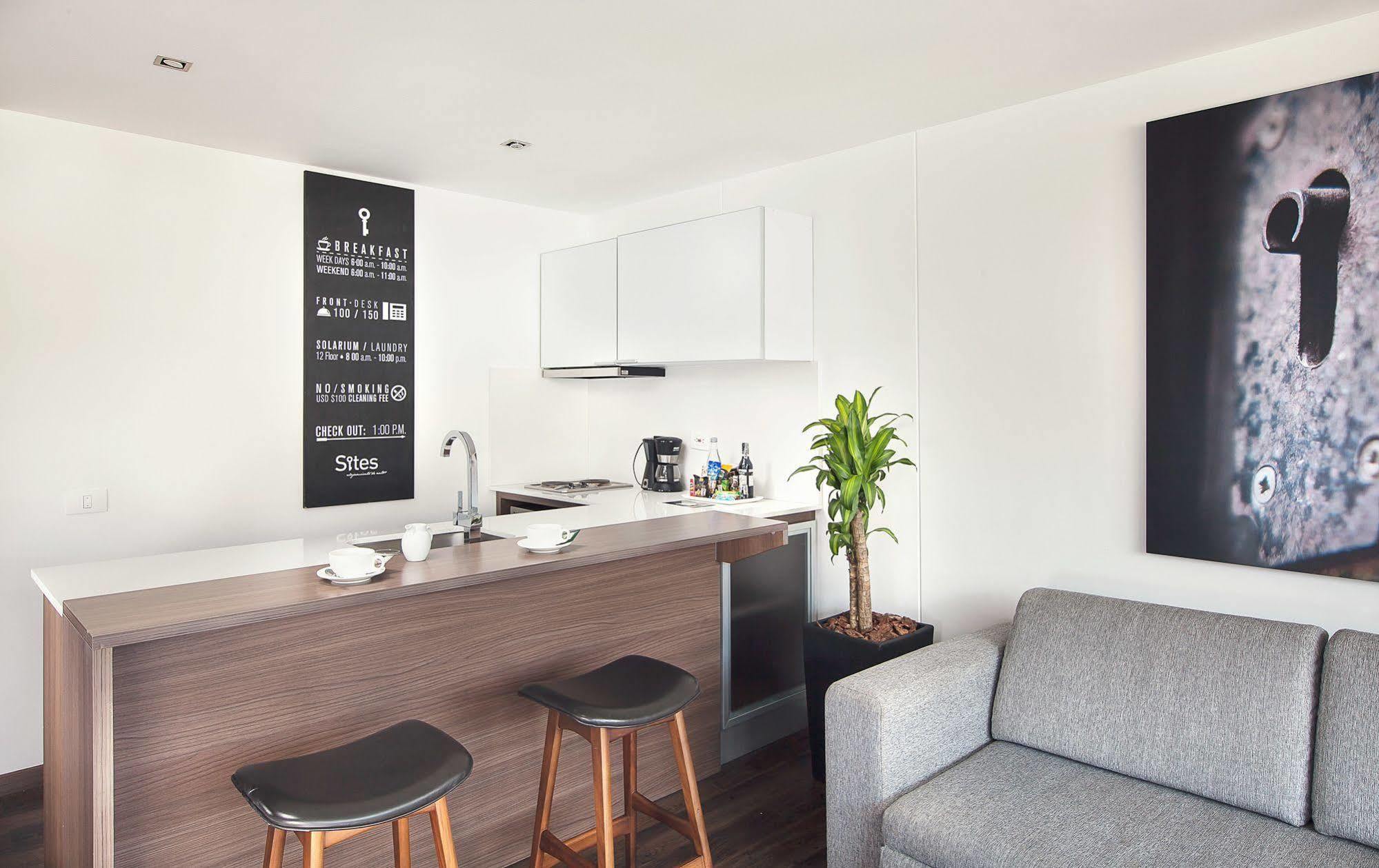 فندق سايتس ميديلين المظهر الخارجي الصورة A kitchen in a serviced apartment